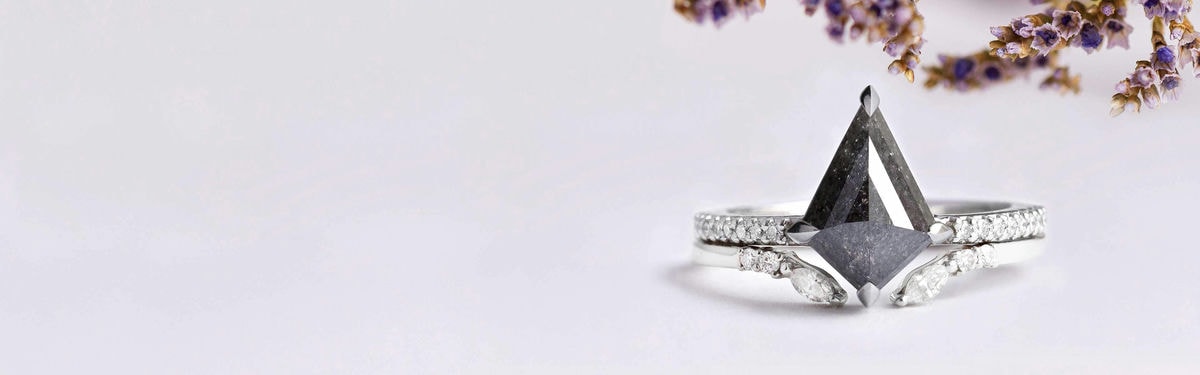 half eternity and kite salt and pepper diamond wedding ring with open chevron ring with diamonds