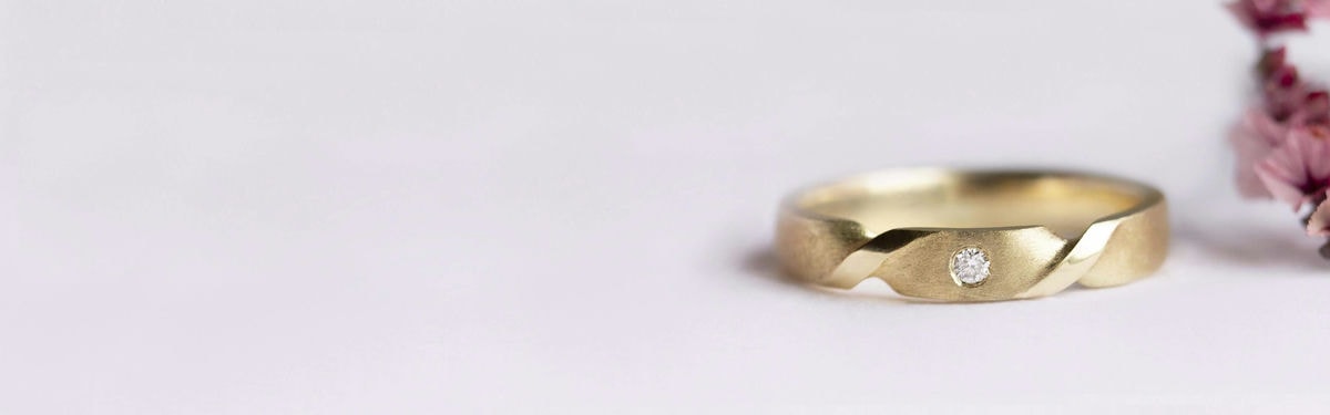 double mobius wide wedding ring in yellow gold