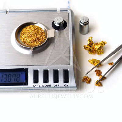 gold weighing different karats
