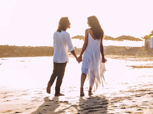 engagement by the beach boho couple
