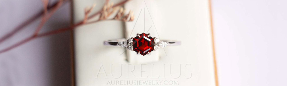 white gold garnet rings with diamonds made by aurelius jewelry