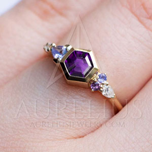 cluster ring with amethyst center stone