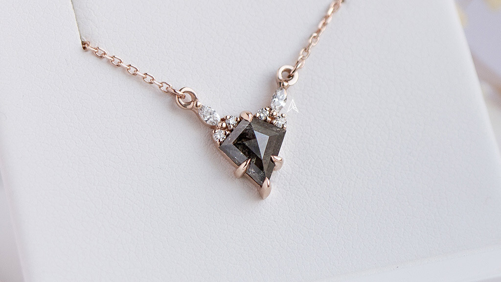 small dark diamond in kite shape a perfect fit in this necklace