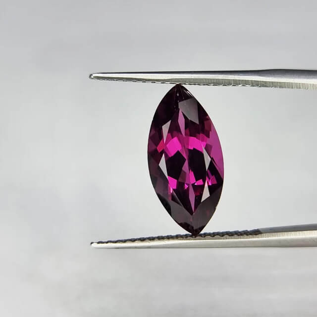 purple marquise-cut garnet gem