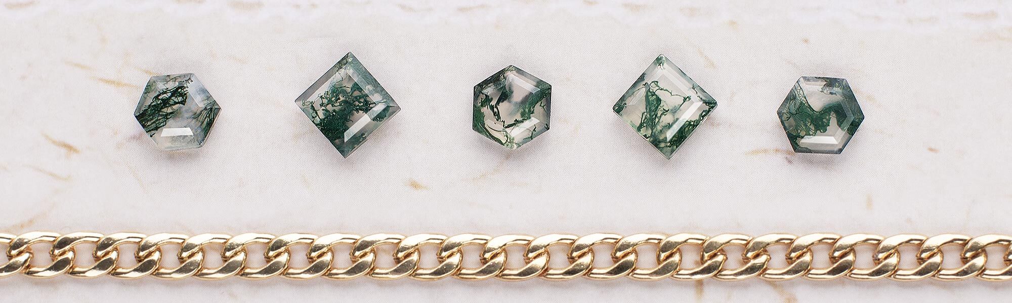 examples of moss agate gemstones with green inclusions - a perfect stone for the nature lover