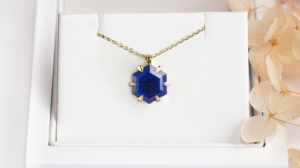 hexagon lapis lazuli on a necklace in 14k yellow gold