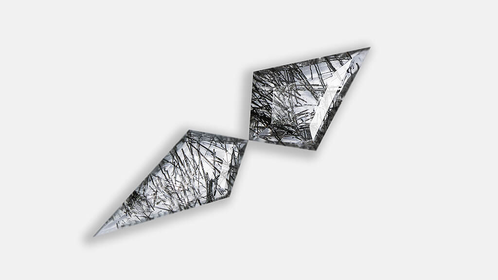 two kite rutilated quartz gemstones