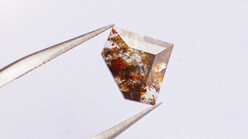 fiery looking shield shaped diamond for a future ring or other jewelry